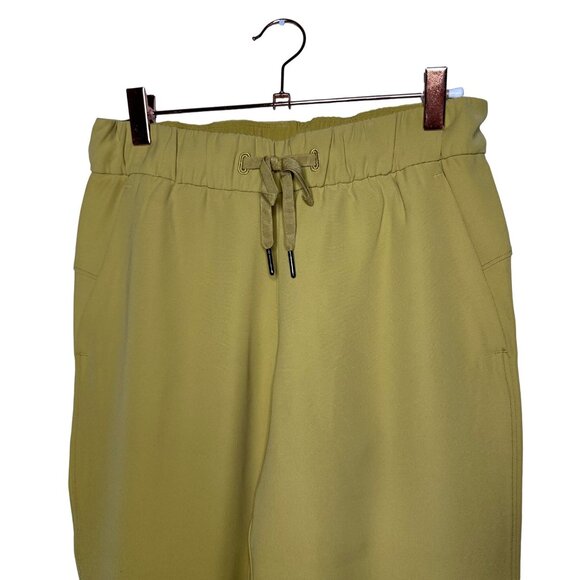 Lululemon On the Fly 7/8 Pant Size 4 Vintage Gold Mustard Yellow Woven - Picture 3 of 10